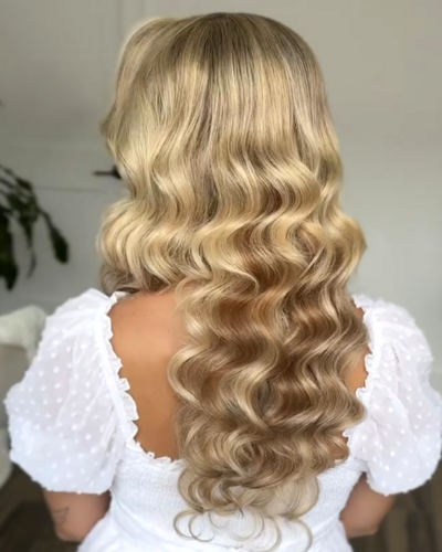 Blonde loose glam waves hairstyle 