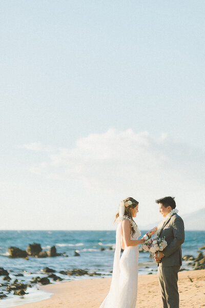 bride and groom say their vows on a Kihei beach in Maui 