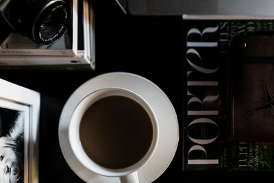 desk with coffee and magazine