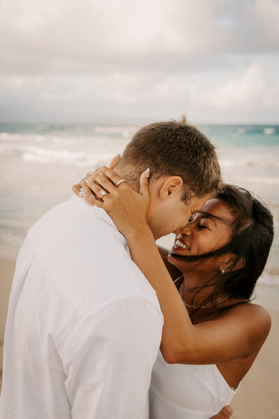 Maui Wedding Photographer captures couple hugging during sunset beach wedding bridals