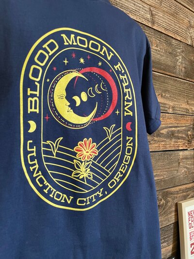 Blood Moon Farm, Junction City, Oregon custom printed shirt for local company with moon and flower field artwork.