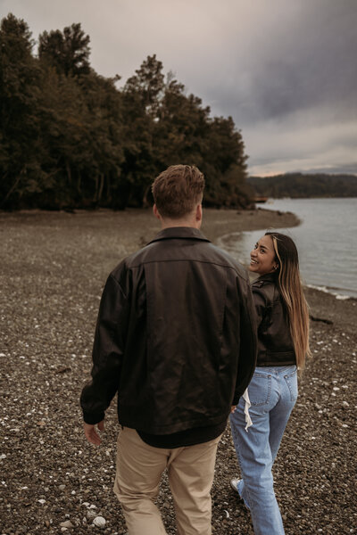 guy giving a bear hug to his gril