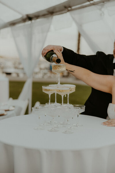 Champagne tower pour at a Long Beach wedding, coordinated by Beyond the Event and captured by Kellie Jane Photography.