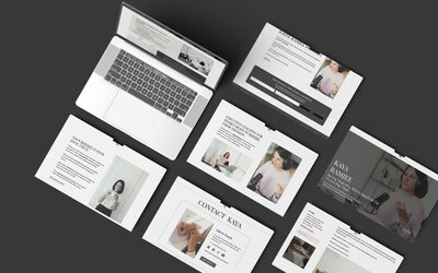 Flat lay of a laptop and eight overlapping website mockups showing a elite female coach speaking into a microphone, contact forms, and motivational text about mindset and executive coaching.