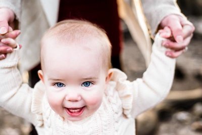 blue eyed toddler smiles mischieviously, Rattlesnake Lake | Meg Sivakumar Photography