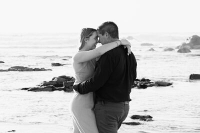 Couple in loving embrace on beach