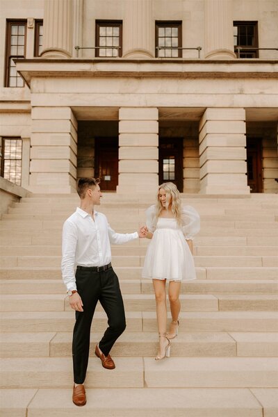 couple on the steps at their nashville wedding