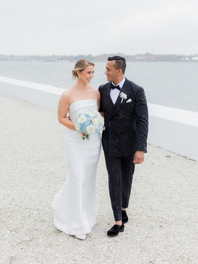 Belle Mer Newport wedding - bride and groom in the rain