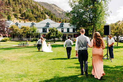 Wedding guests walking grounds at Chico Hot Springs in Pray, MT