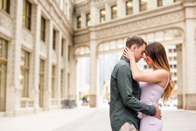 Couple Engagement photo at the Wrigley Building in Chicago, Illinois.