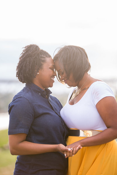 Same-sex couple dancing together