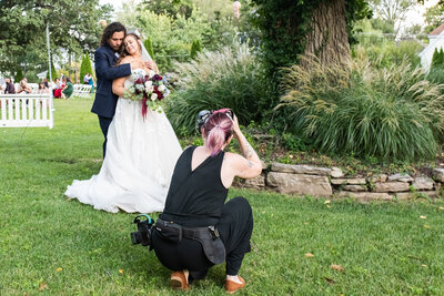 Behind-the-scenes photo of St. Louis wedding photographer Kelly Cook at work