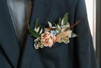 Boutonnieré on navy suitjacket