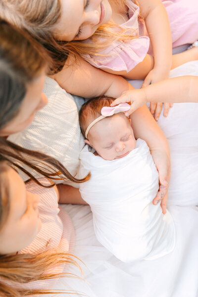 Newborn Photography Session with five sisters at the UNC Asheville Botanical Gardens with Asheville Newborn Photographer, Rachel Marie Photography