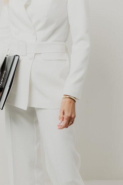 a wealth and business coach at her personal branding photo shoot