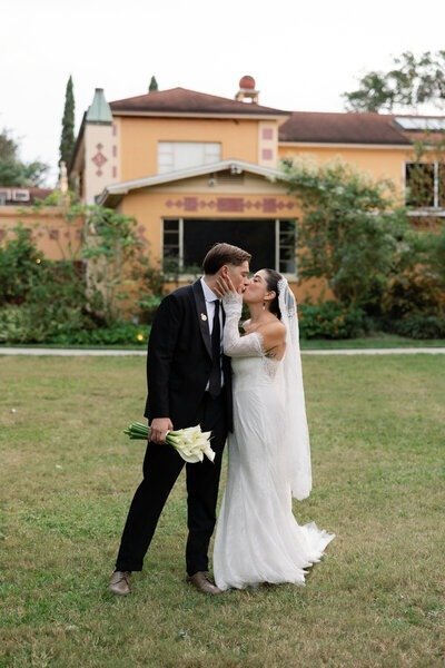 Romantic newlywed portrait in front of estate by photographer Puerto Rico

