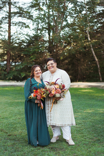 Bride standing with one of bridesmaids