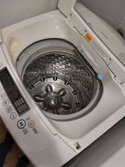 Clean washing machine Rocket City Clean Up Crew LLC Logo