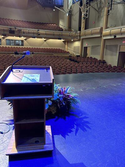 podium on stage at an event 