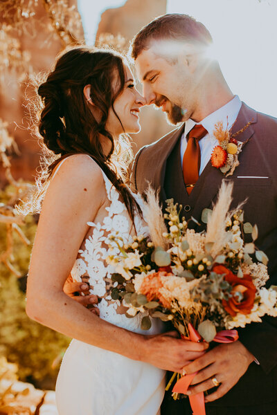 bride and groom in wedding attire in sedona