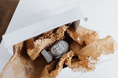 granite-buddha-bust-in-cardboard-package-4464487