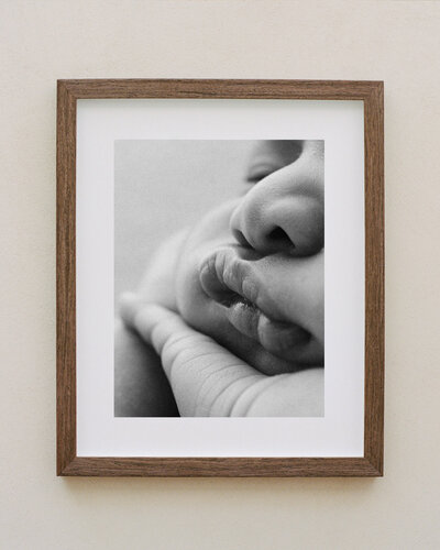 a professionally printed and framed newborn print, photographed by canterbury's top newborn photographer lucy jane