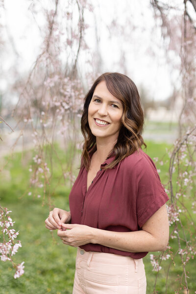Photographer smiling outdoors