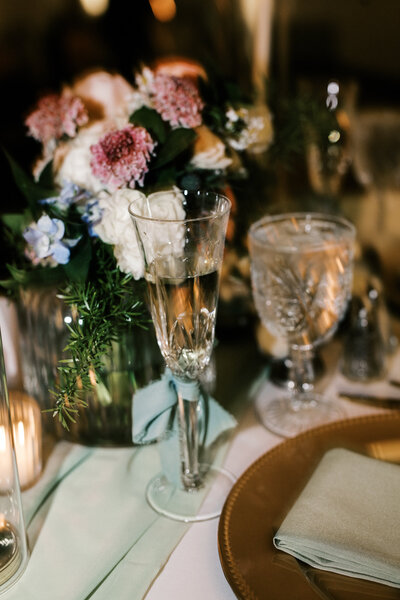 Outdoor ceremony at Bella Collina featuring Tuscan architecture and floral aisle runners, documented by a Florida-based editorial wedding photographer.