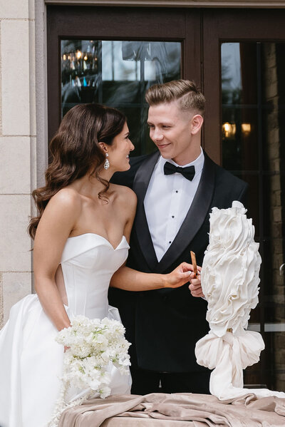 bride and groom staring lovingly into each others eyes