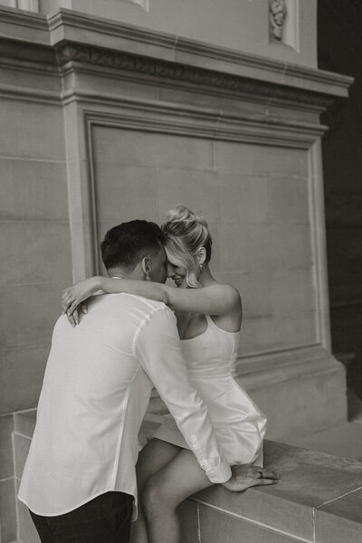 Beautiful couple engagement session photoshoot at San Francisco City hall, makeup and hair styled by Yana Beauty Studiio.