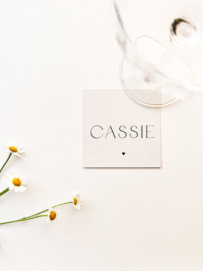 Name place card with wine glass for wedding