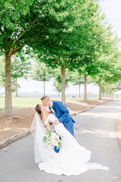 Groom dipping bride for a kiss  | Auburn AL Wedding Photographer Amanda Horne