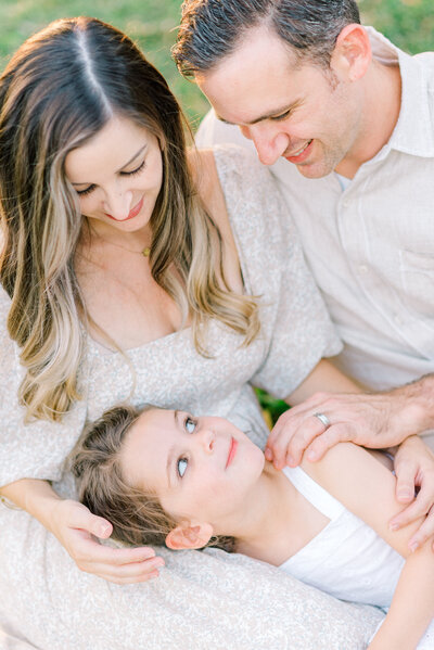 parents-smiling-at-child