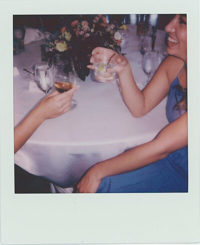 Polaroid of guests at a wedding
