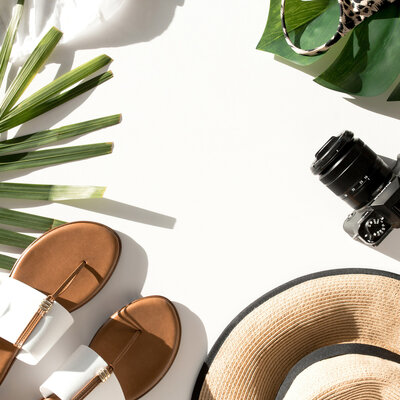 camera, hat and sandals