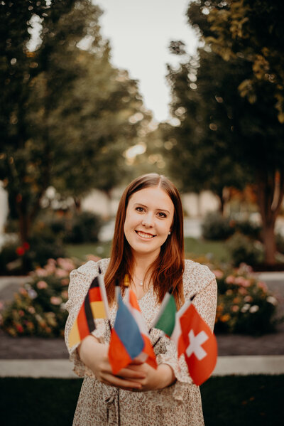 LDS Missionary Holding Country Flags in Idaho