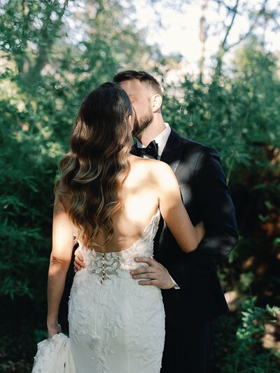 Bride and groom walk up memorial steps at their DC wedding