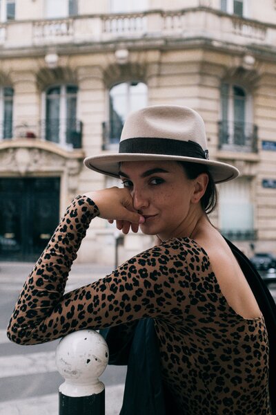 Woman in a cheetah print shirt