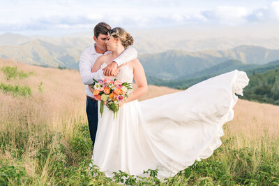 A couple on Roan Mountain  eloping at sunset by JoLynn Photography, a Raleigh wedding photographer