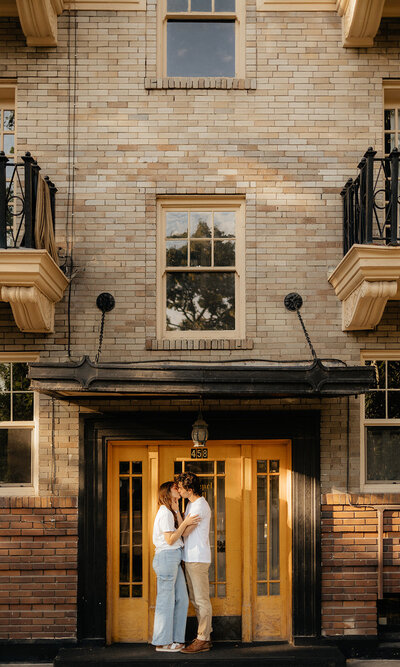 couple kissing during engagement photos