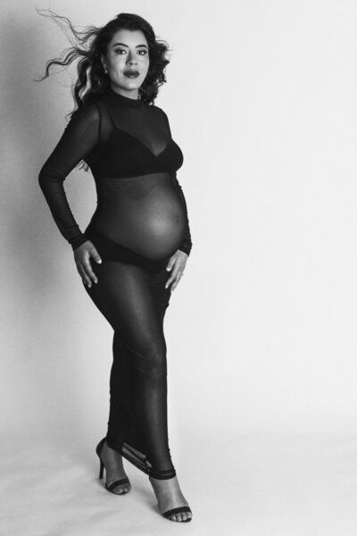 maternity session in sheer skin tight maxie black dress