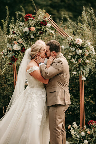 Ceremony kiss at Canton Ga venue with small wedding packages
