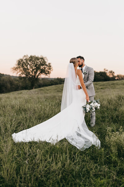 man and woman kissing