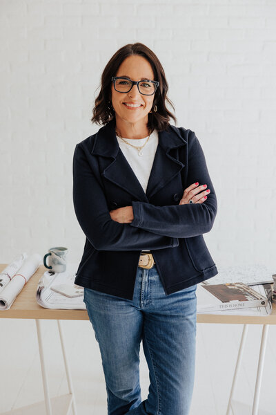 mary leaning on desk