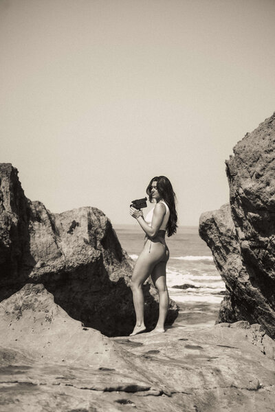 Girl holding film camera