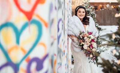 Bride posing with flowers | Winter Wedding at The Hamilton Manor | Hamilton Township, New Jersey