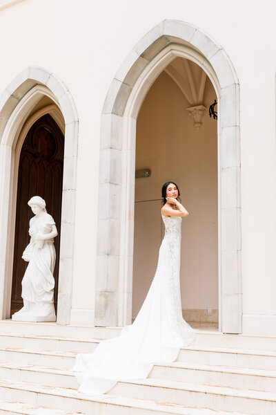 Wedding Photographer in Texas, Light and Airy, Luxurious Bridal Portrait Outside under gorgeous architechure