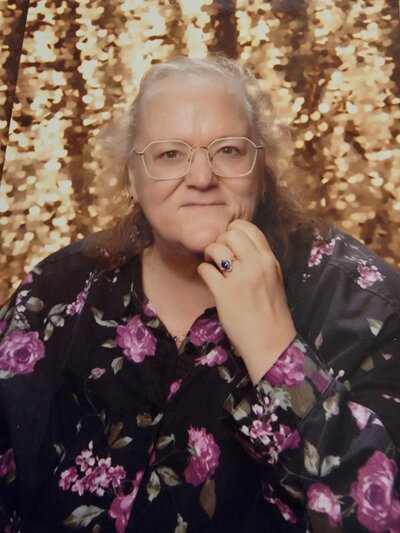 headshot of Peggy, owner of A+ Taxes