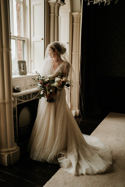 bride portrait at window