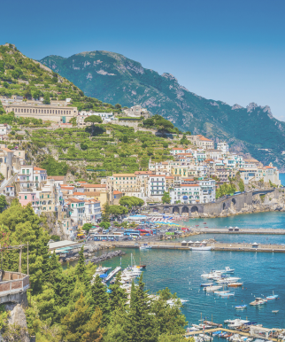 Cliffside village on the Amalfi Coast with colorful homes and Mediterranean sea views.